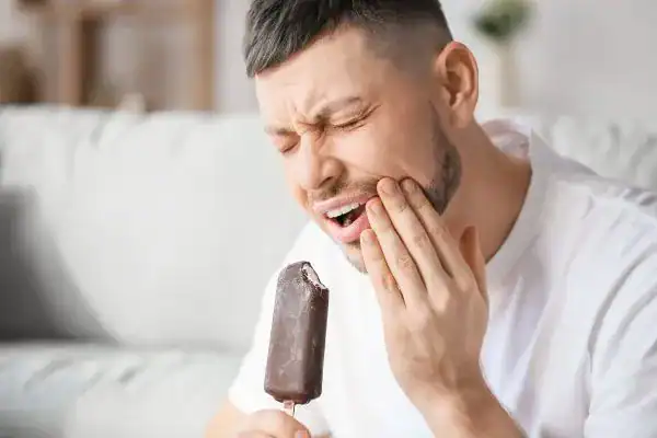 man experience sensitive teeth Aldershot